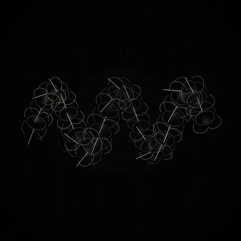 Intricate flowing abstract line art pattern on dark background for modern d.. Stock Footage 345690409