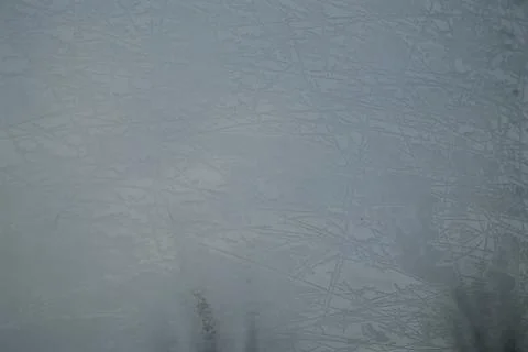 Intricate frost patterns on a cold window pane Foto stock