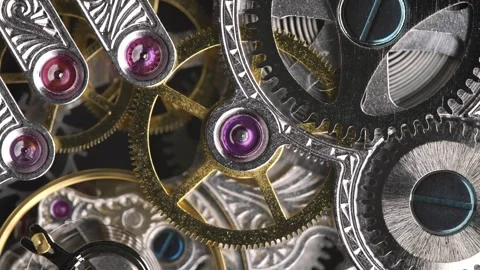 The Intricate Heart of Time: A Macro View of an Antique Pocket Watch's Working Stock Footage 252776323