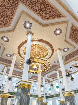 Intricate Islamic Ceiling and Chandeliers in the Interior of Darussalam Mosque, Stock Photos