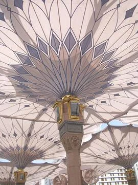 Intricate Islamic Pattern and Grand Umbrella Architecture at Prophet's Mosqu Stock Photos