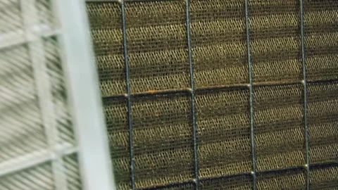 Intricate Metallic Weave of an Advanced Air Purification Filter Stock Footage 340482243
