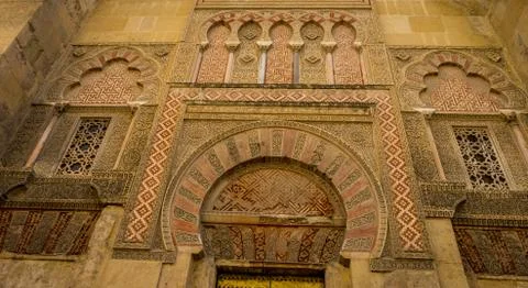 Intricate moorish design pattern on the wall of a building in Cordoba Stock Photos
