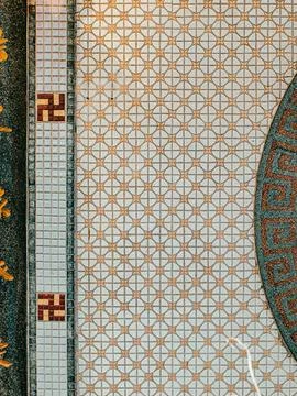 Intricate Mosaic Tile Pattern with Border Detail on Thai Temple Wall Stock Photos