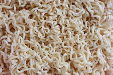 Intricate Pattern of Dried Instant Noodles Close-Up Reveals Textural Delights Stock Photos