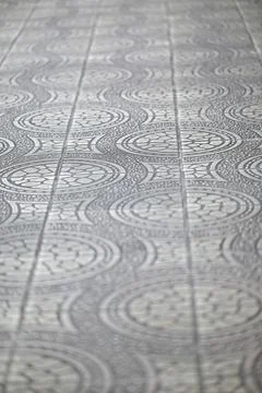 Intricate patterned floor with circular designs Stock Photos