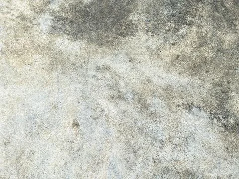 The intricate patterns on the cement wall create a mesmerizing abstract desig Stock-Fotos