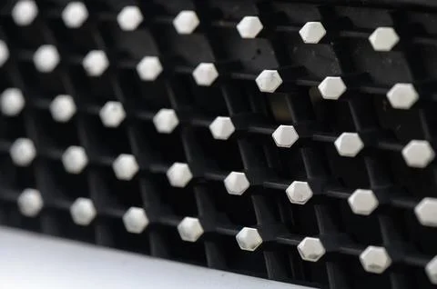 Intricate patterns of hexagonal shapes create a dynamic texture in a close-.. Stock Photos