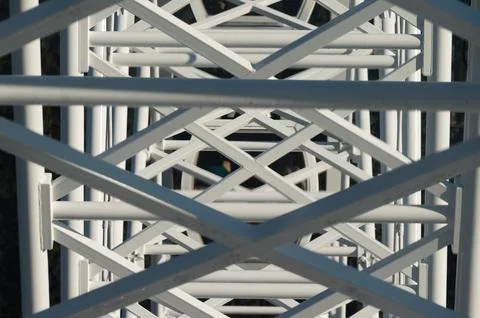 Intricate patterns of white lattice create a mesmerizing perspective from a.. Fotos de archivo