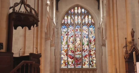 Intricate Stained Glass Window Illuminates Gothic Cathedral Interior Stock Footage 336473242