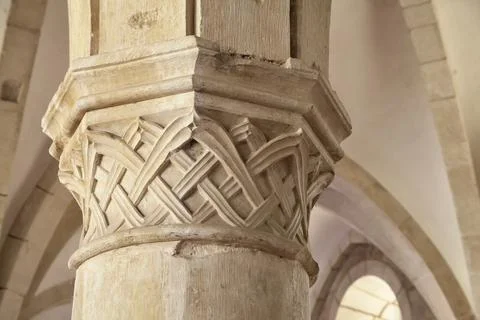 Intricate stonework adorns a column at Monastery Santa Maria Stock Photos