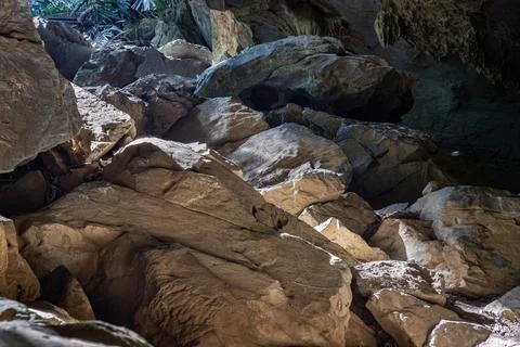The intricate sunlight shining through down to Stalagmites inside Cave of H.. Stock Photos