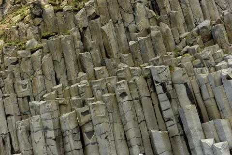Intricate texture of volcanic basalt columns on Reynisfjall mountain Iceland Stock Photos