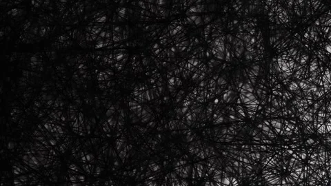 An intricate web of black threads forming a dense and chaotic abstract pattern.  Stock Footage 304357753