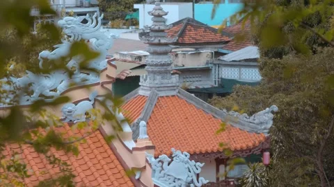 An intricately carved stone Dharmachakra or Wheel of Dharma held by dragons Stock Footage 340454446