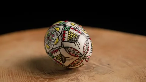 Intricately painted white Easter Egg rotating Stock Footage 283768445