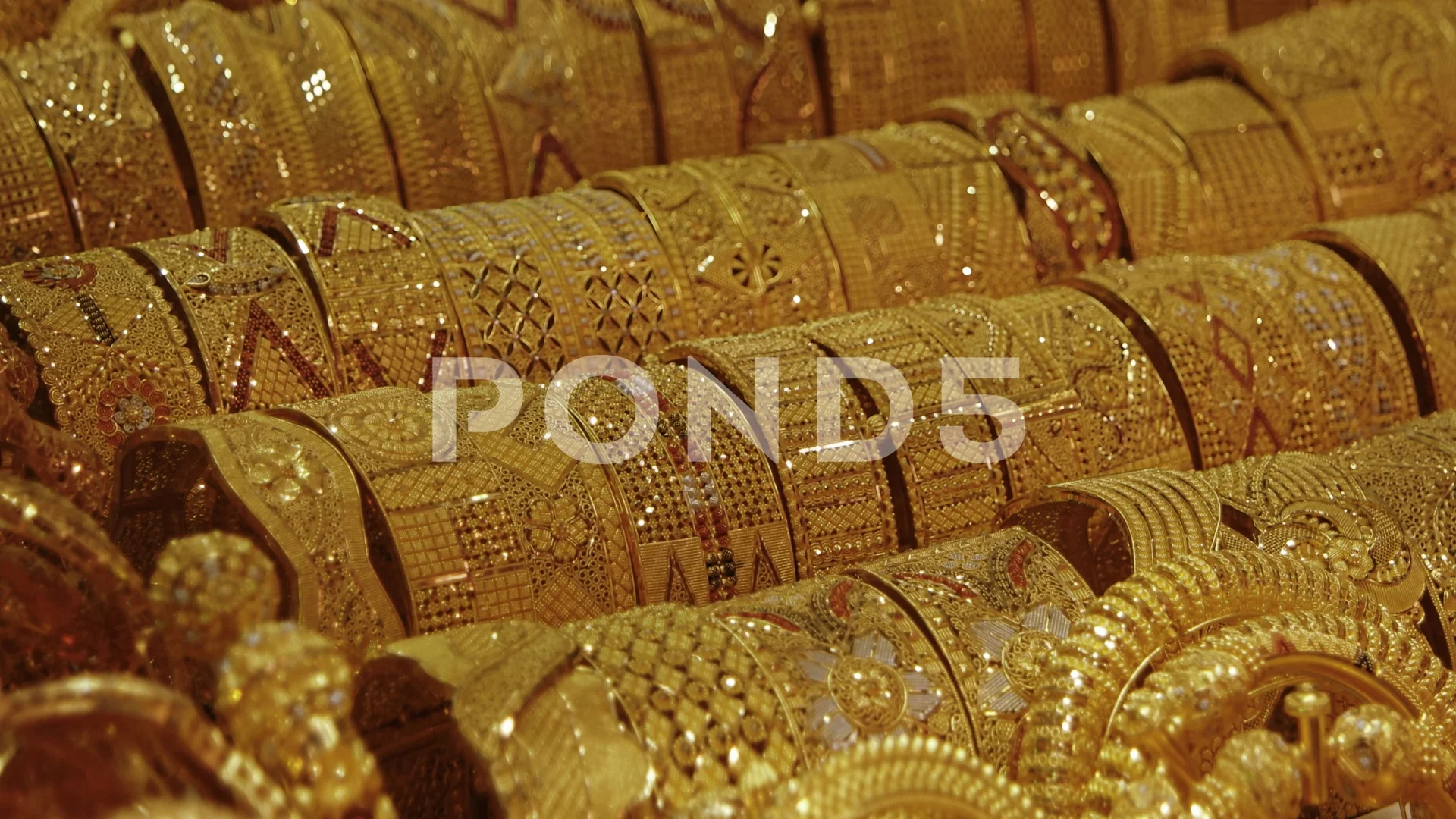 Intricately Patterned Gold Jewelry in a ... | Stock Video | Pond5
