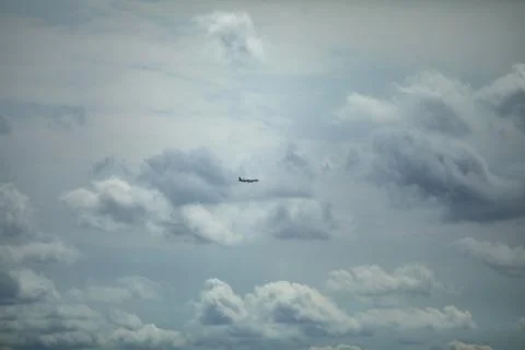 An intriguing and mysterious object has been sighted within the clouds up in the Stock Photos