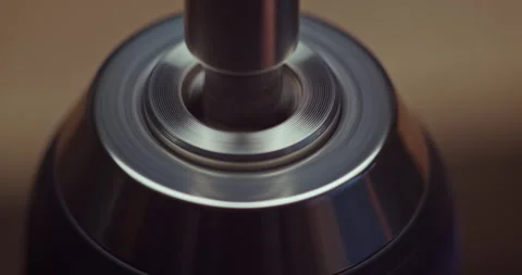 An intriguing closeup view of a sophisticated metallic device exemplifying its Stock Footage 297952780