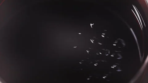 Intriguing Ferrofluid Movement in a Dark Liquid Displaying Magnetic Magic Stock Footage 325486899