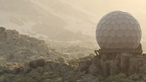 Intriguing Spherical Structure Atop Rocky Hills in a Quiet Landscape at Dawn Stock Footage 344954427
