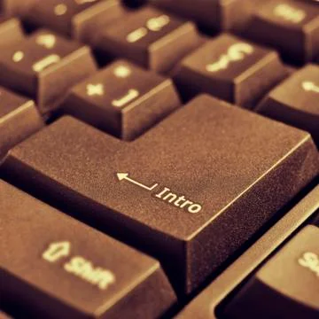 Intro key of a computer keyboard, with a retro effect Foto stock