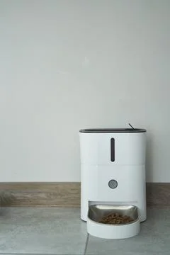 Introducing the Automatic Pet Feeder for Convenient Pet Care with ease and Stock Photos