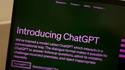 Introducing ChatGPT on openai.com website displayed on laptop computer Stock Footage 235031328