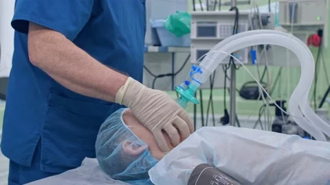 Introducing a patient to anesthesia before surgery Stock Footage 150888718