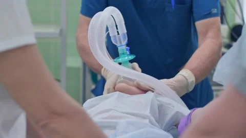 Introducing a patient to anesthesia before surgery Stock Footage 150891583