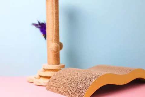 Introducing a Stylish Cat Scratch Post and Mat designed for maximum Playful Stock Photos