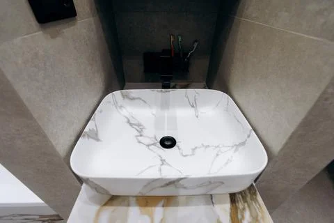 Introducing a Stylish Square Marble Sink Design Perfect for Modern Bathrooms and Stock Photos