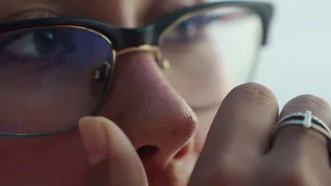 Introspective gaze present. Close view of contemplative individual showing Stock-Footage 345168211