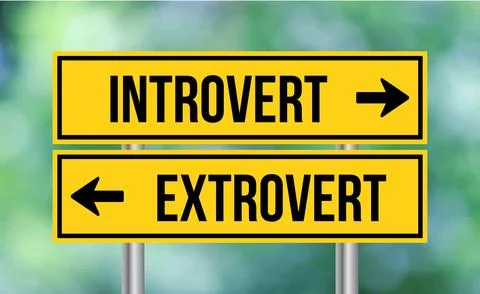 Introvert or extrovert road sign on blur background Stock Photos