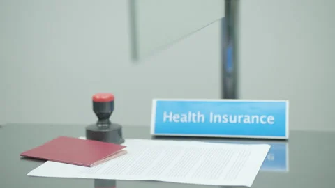 Invalid with bionic prosthetic arm shaking hands with insurer Stock Footage 247709805