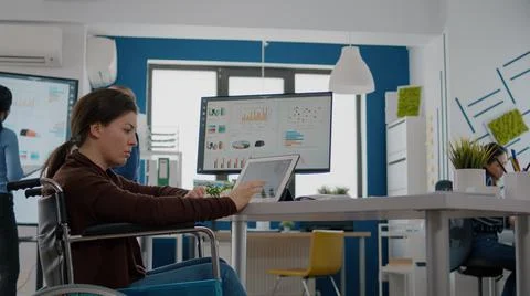 Invalid entrepreneur using pc and tablet in same time checking graphs 写真素材