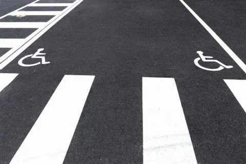 Invalid parking spaces Stock Photos