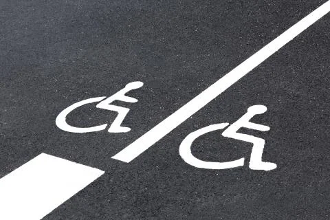 Invalid parking spaces Stock Photos