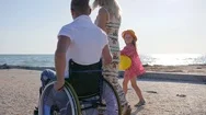Invalid With Wife And Daughter Have Good Time On Sea, Happy Disabled Daddy Stock Footage