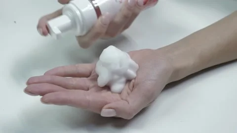 Invented a new mousse for soft hand skin Stock Footage 164141303