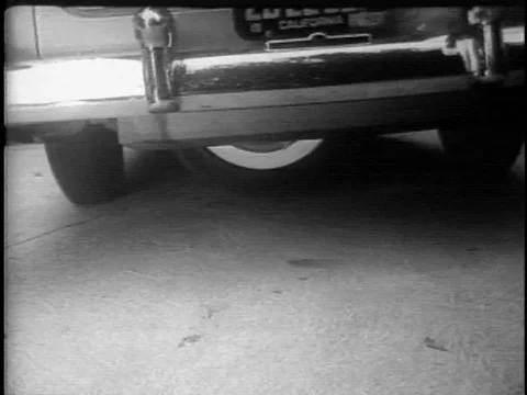Invention of Car with Five Wheels Makes it Easier to Parallel park 1950s Stock Footage 80745231