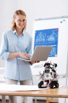 Inventive engineer testing self automatic robot in the lab 스톡 사진