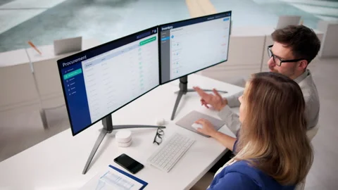 Inventory Analyst Carefully Managing Supply Chain Data Stock Footage 332501118