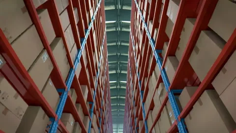 Inventory control, order fulfillment or space optimization, cardboard boxes on Stock Footage 310307650