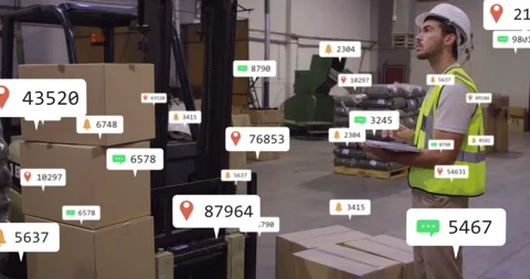 Inventory tech tapping tablet, starting AR tags on boxes and forklift, verifying Stock Footage 331789976