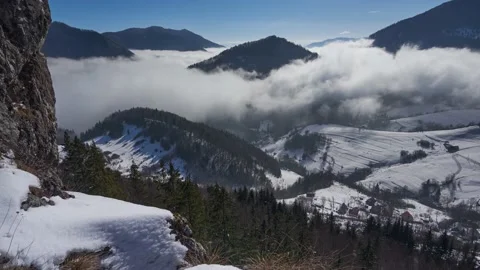 Inverse low clouds holding in the valley of the village Stock Footage 150331411