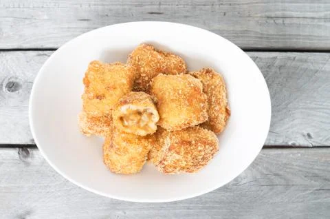 Inversed poutine - inside out poutine - cheese and brown sauce inside covered Stock Photos