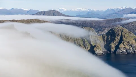 Inversion flowing over the coastline Stock Footage 122953133