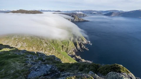 Inversion flowing over the coastline Stock Footage 122953788