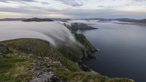 Inversion flowing over the coastline Stock Footage 122964146